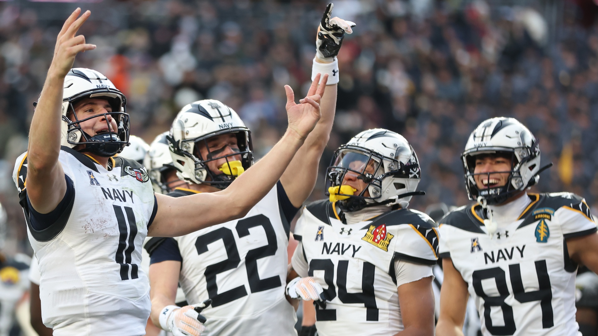 Midshipmen quarterback Blake Horvath celebrates scoring a touchdown in the 2024 Army vs Navy game