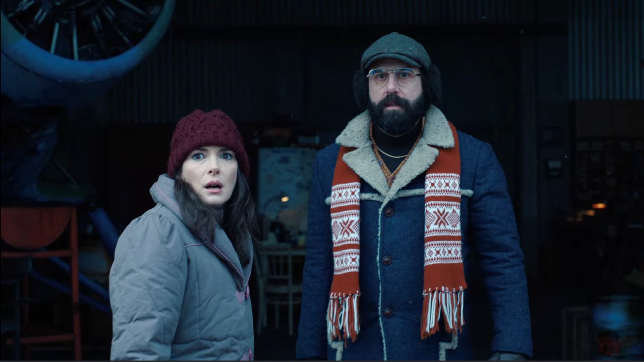 Winona Ryder and Brett Gelman as Joyce and Murray in Stranger Things
