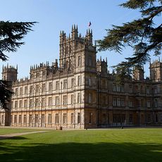 downtown highclere castle with green lawn