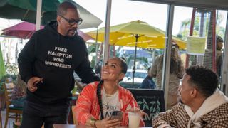 Eddie Murphy, Lauren London and Travis Bennet as Akbar, Amira and Omar at a restaurant in You People