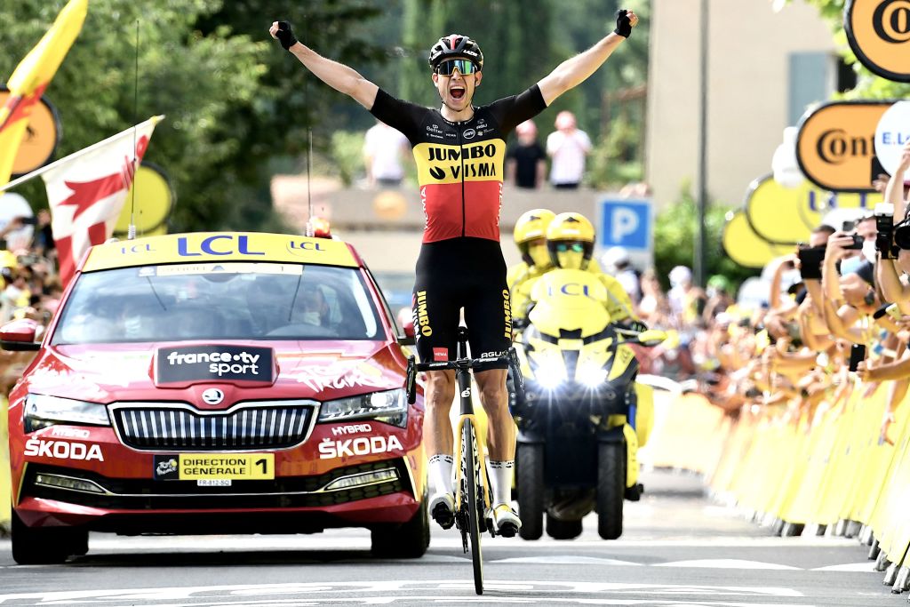 TOPSHOT Team Jumbo Vismas Wout van Aert of Belgium celebrates as he crosses the finish line at the end of the 11th stage of the 108th edition of the Tour de France cycling race 198 km between Sorgues and Malaucene on July 07 2021 Photo by Philippe LOPEZ AFP Photo by PHILIPPE LOPEZAFP via Getty Images