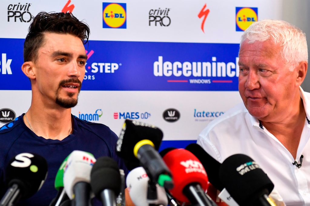 Frances Julian Alaphilippe L and Belgian General manager of team Etixx  QuickStep Patrick Lefevere R speak during a press conference in Nimes during a rest day as part of the 106th edition of the Tour de France cycling race on July 22 2019 Photo by GERARD JULIEN  AFP        Photo credit should read GERARD JULIENAFP via Getty Images