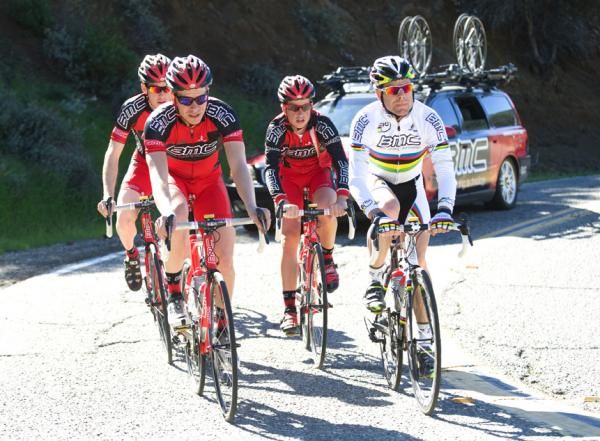 Jeff Louder and Cadel Evans lead a smaller group of riders up the hills, with some of their teammates already up the road.