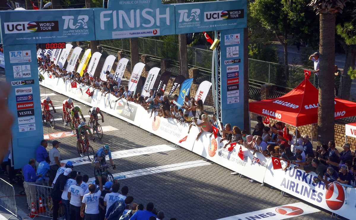 Bennett crosses the line