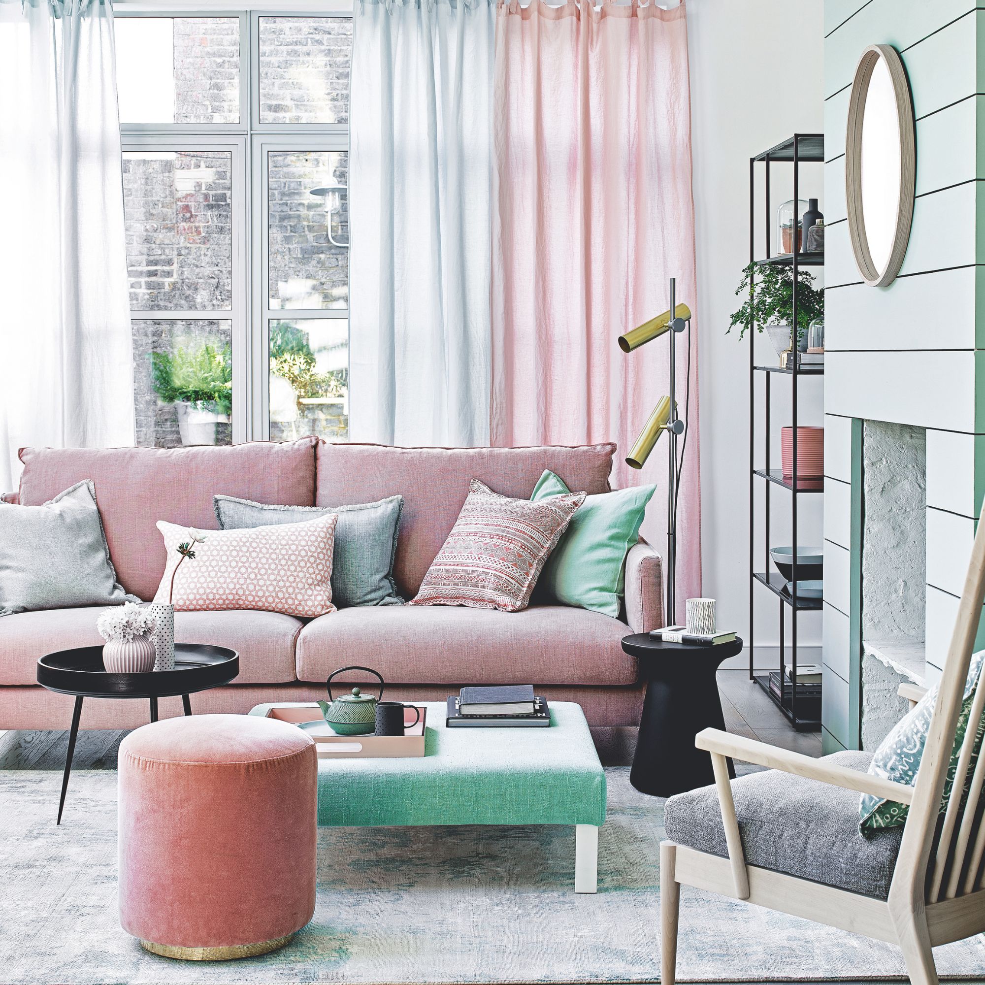 Pink and blue living room scheme with sheer curtains