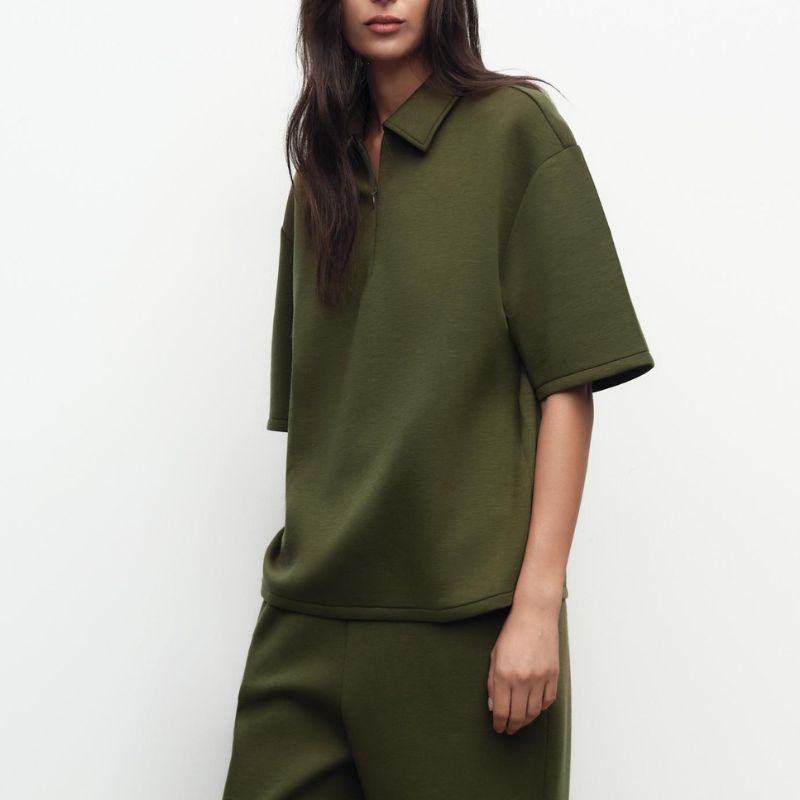 Zara zip up polo top on model 