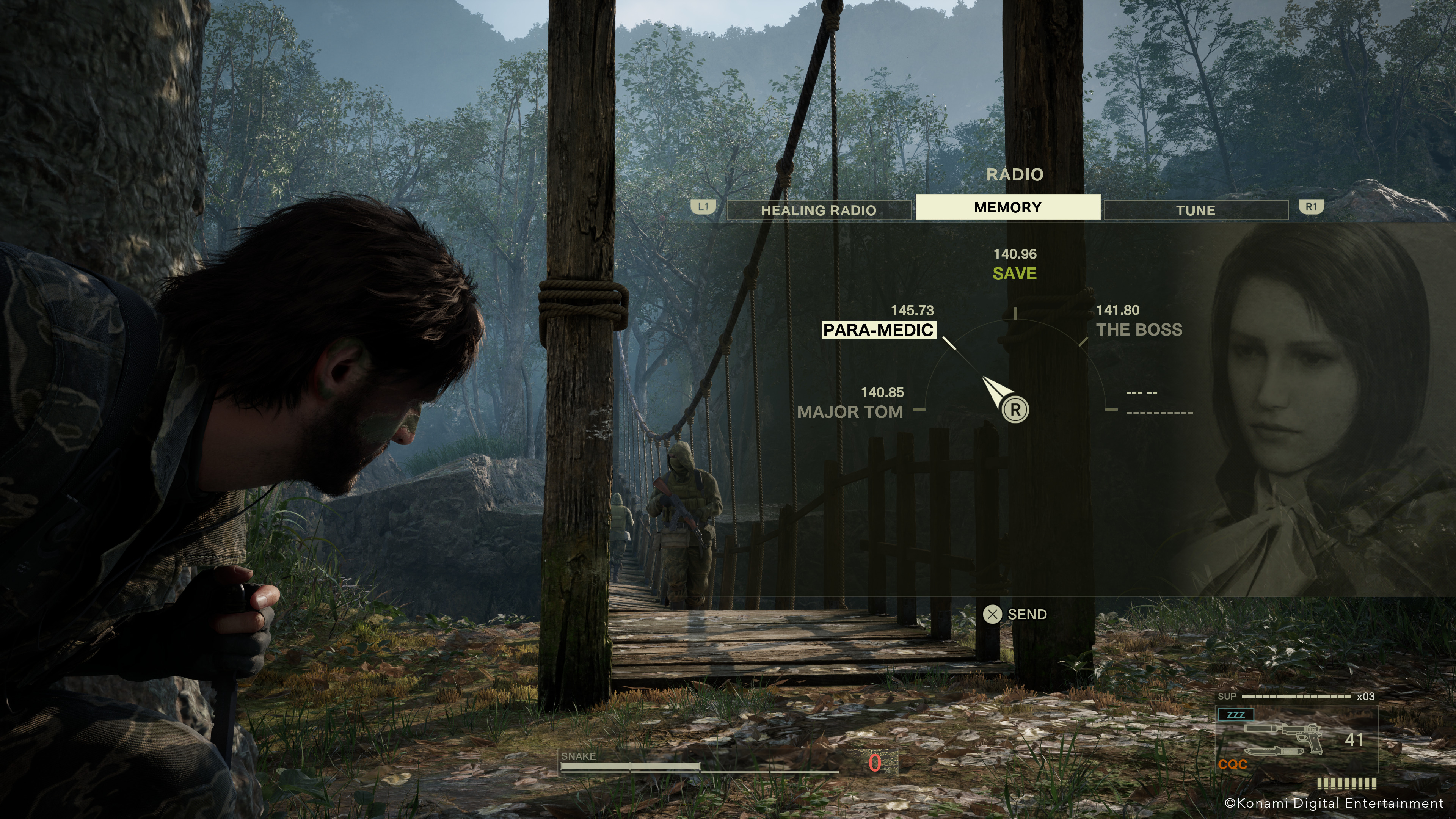 A guard approaches across the rickety rope bridge at Dolinovodno.