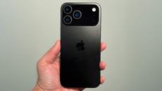 iPhone 17 Pro leak – dummy handset held against green background