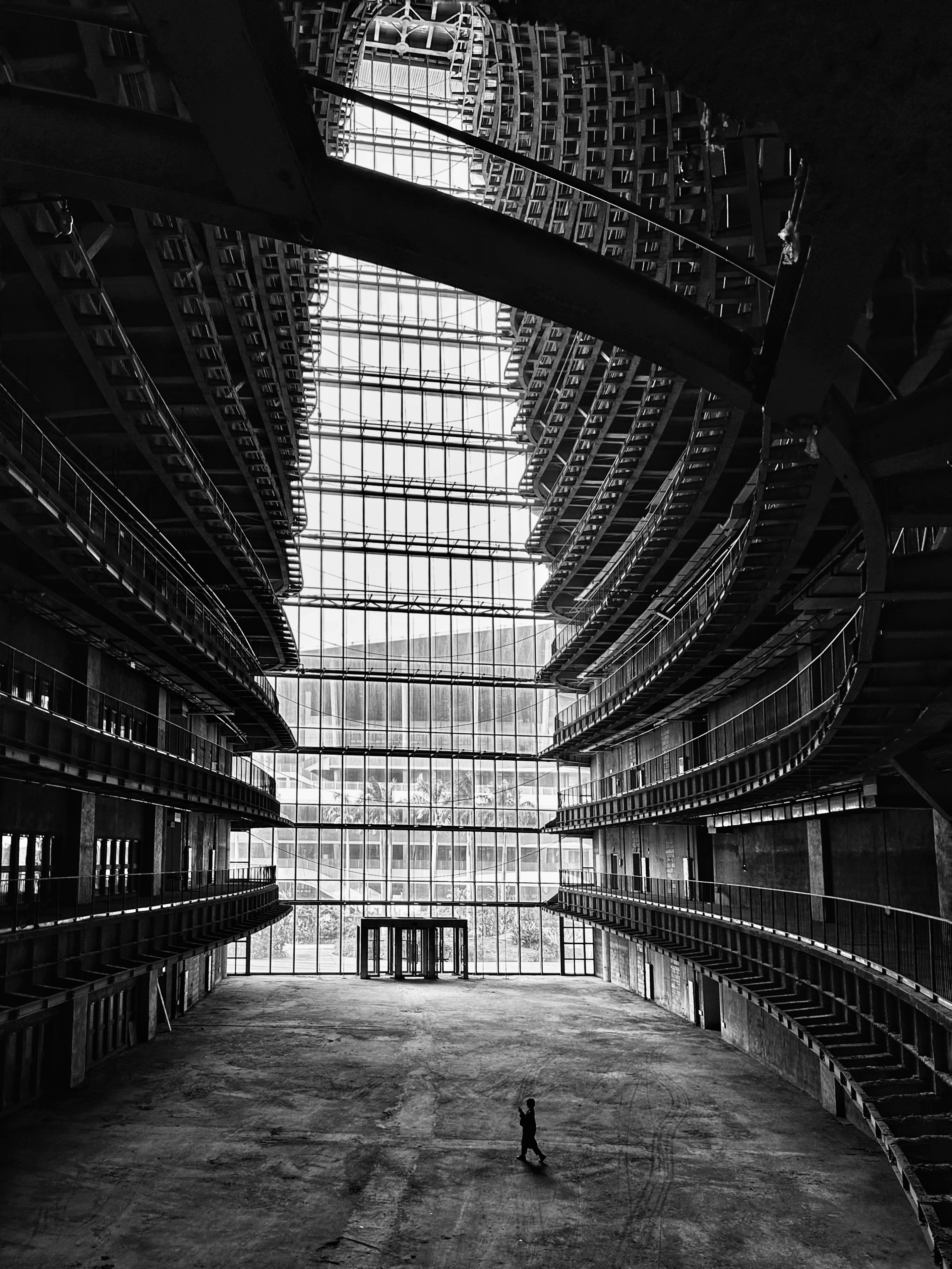 Light entering through the windows of a large modern building