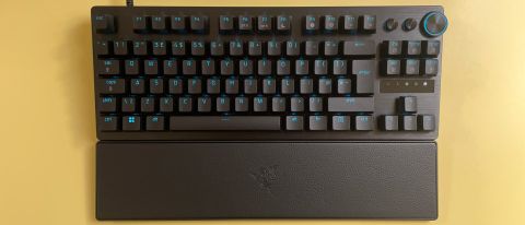 The Razer Huntsman V3 Pro Tenkeyless mechanical gaming keyboard against a yellow background.