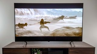 LG B4 OLED TV on table in living room