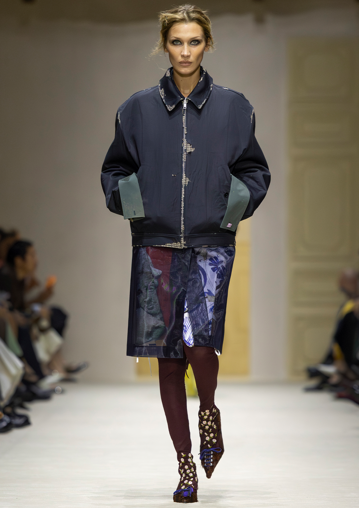 Bella Hadid wearing the jacket in the Prada F/W 26 runway show.