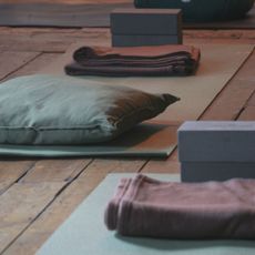 A woman doing Pilates at a Pilates studio