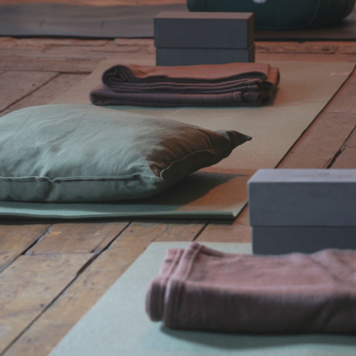 A woman doing Pilates at a Pilates studio