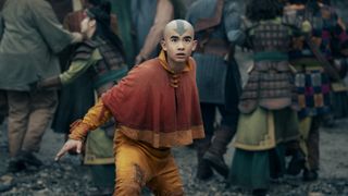 Gordan Cormier as Aang in season 2 of Avatar: The Last Airbender looking up at something off camera.
