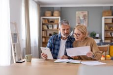 Engaged Couple Discussing Financial Strategies and Options