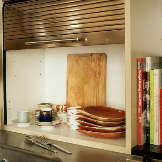 kitchen storage with cup and saucer