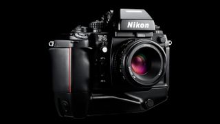 Nikon F4 camera on a black background