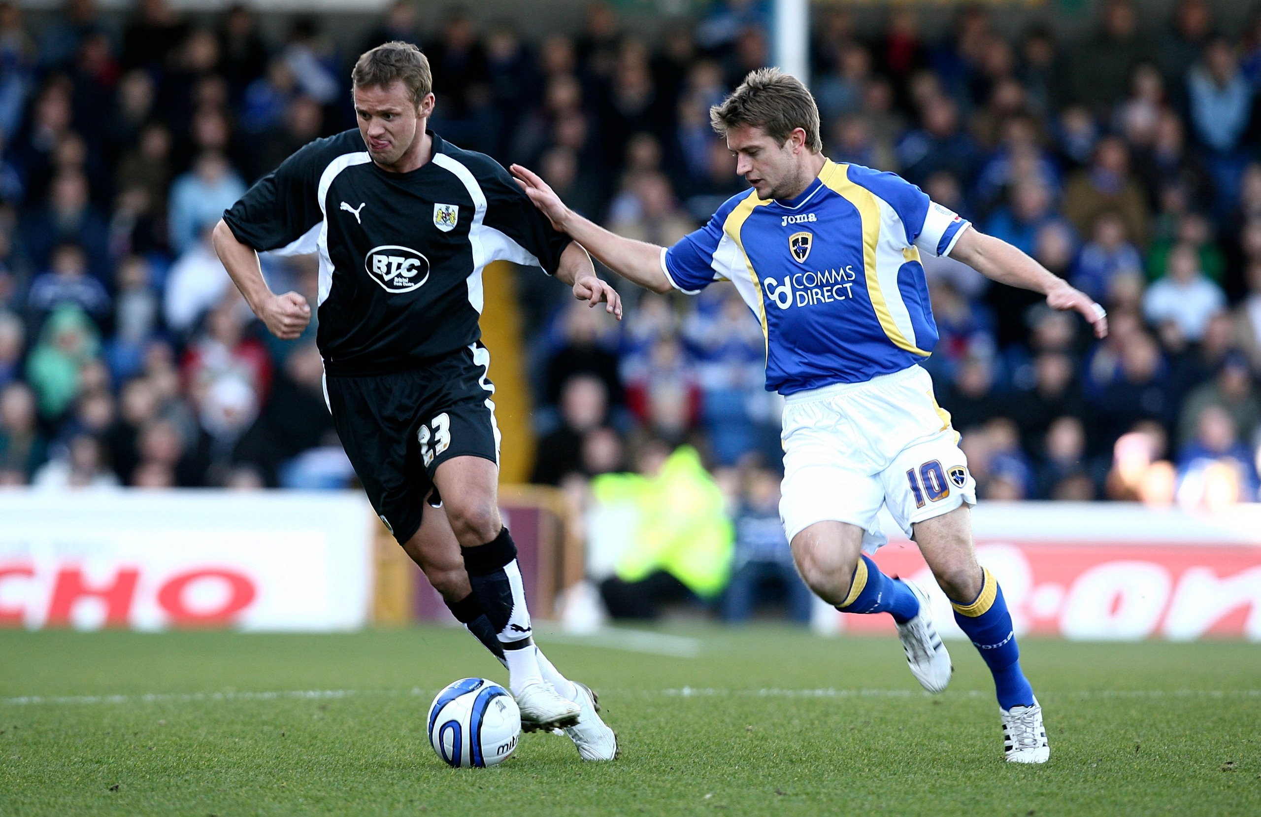 Lee Trundle of Bristol City turns away from Stephen McPhail of Cardiff City