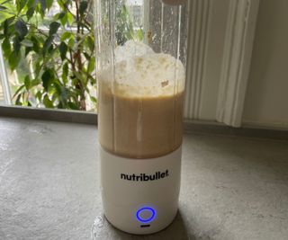 Hummus being blended in the Nutribullet Portable Blender