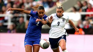 Maelle Lakrar and Alessia Russo fight for the ball during the UEFA Women&#039;s EURO 2025 qualifying match between England and France