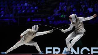 Two fencers on the piste on a Fencing World Championships live stream