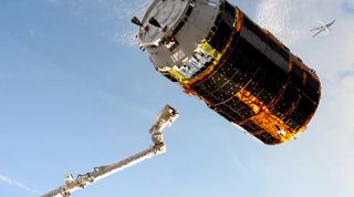 The Japan Aerospace Exploration Agency's HTV-8 cargo ship is released back into space via robotic arm to end its delivery mission to the International Space Station on Nov. 1, 2019.