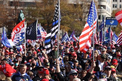 People participate in the “Million MAGA March”