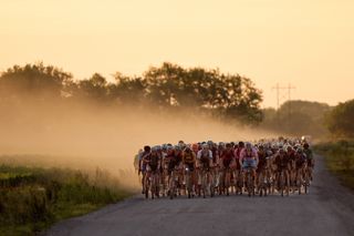 Top elite riders in Life Time Unbound Gravel begin their march across the Kansas prairie as the sun rises