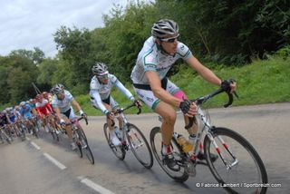 SpiderTech rolls on the front of the peloton.