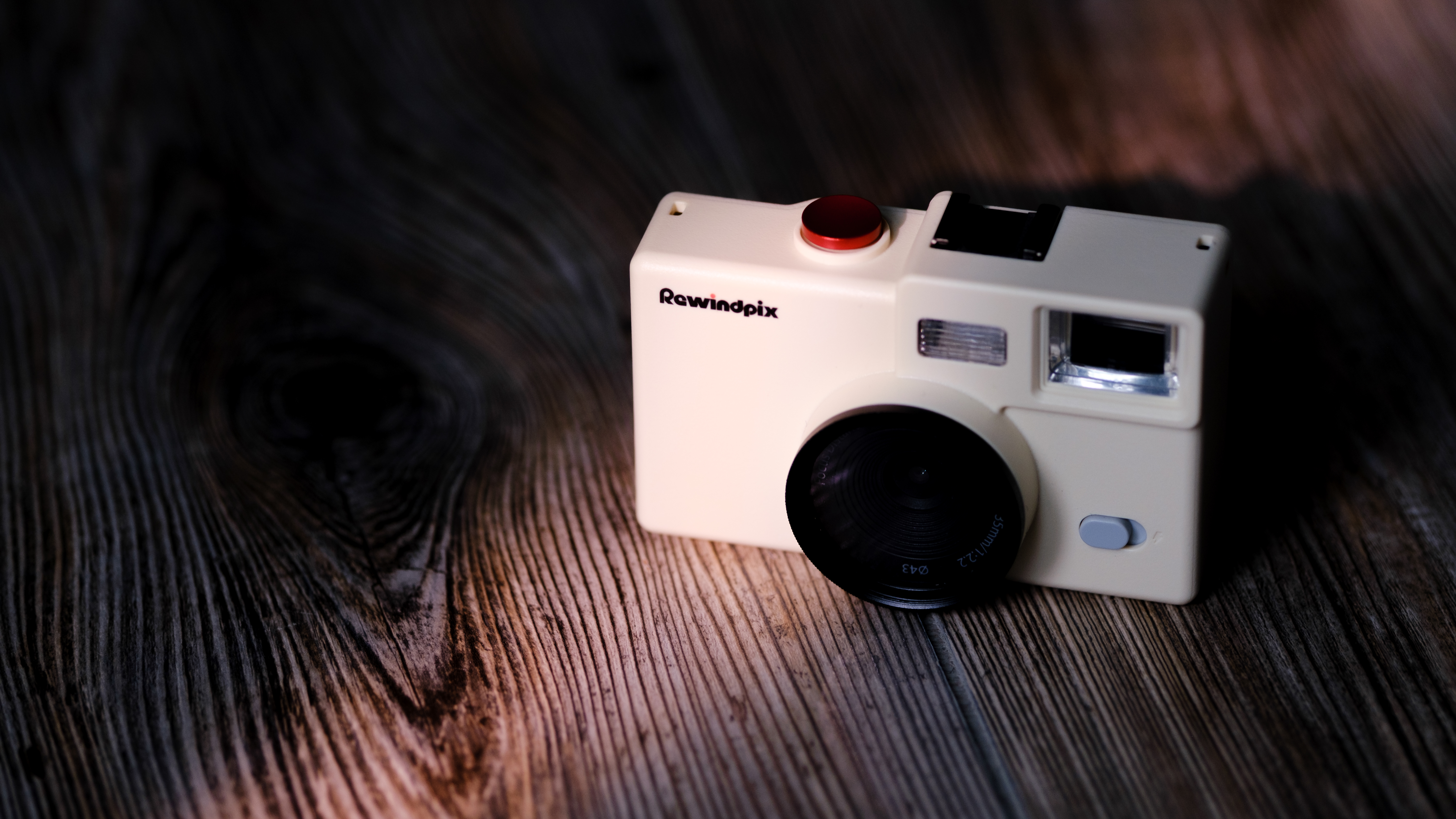 The Rewindpix on a wood background