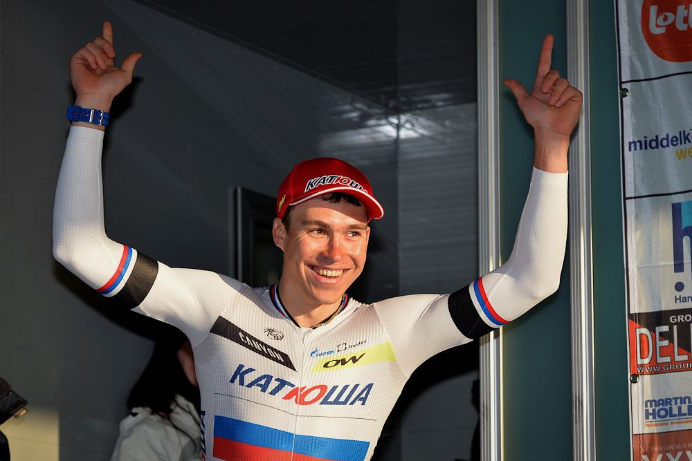 Russian Anton Vorobyev of Team Katusha celebrates on the podium after winning the first day of the Driedaagse van West Vlaanderen.