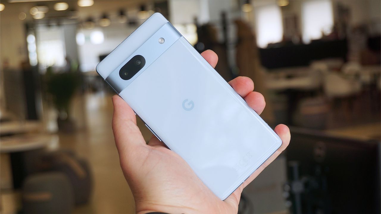 Google Pixel 7a review back angled head on handheld