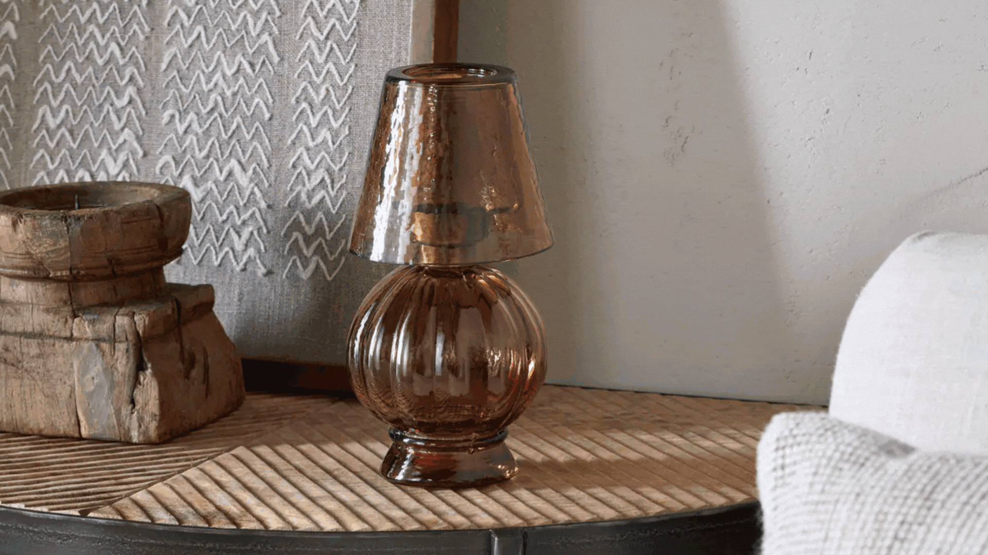 A moving GIF of tealight lamps