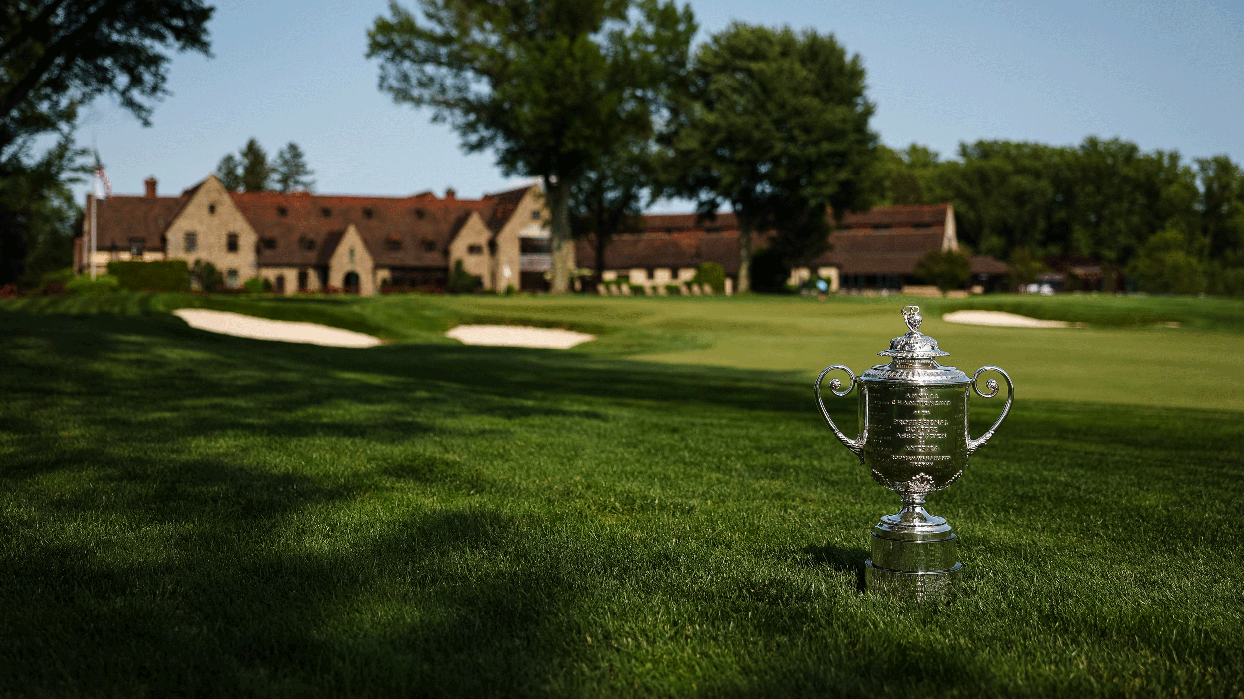 A general view of the Wanamaker Trophy in the foreground and Aronimink Golf Club's clubhouse in the background
