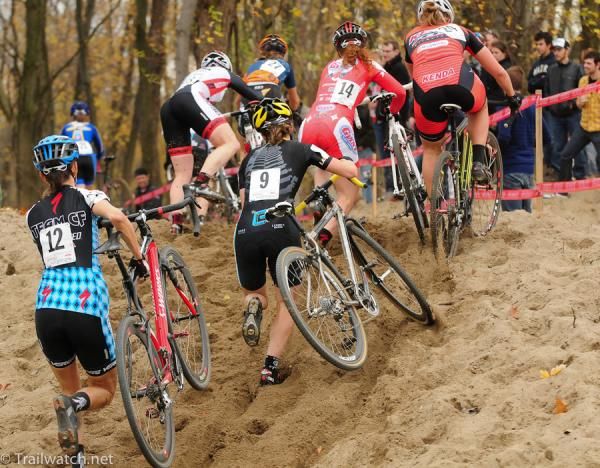 The Elite women struggling with the uphill sand pit