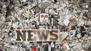 fake news concept with a toy robot and newspaper confetti