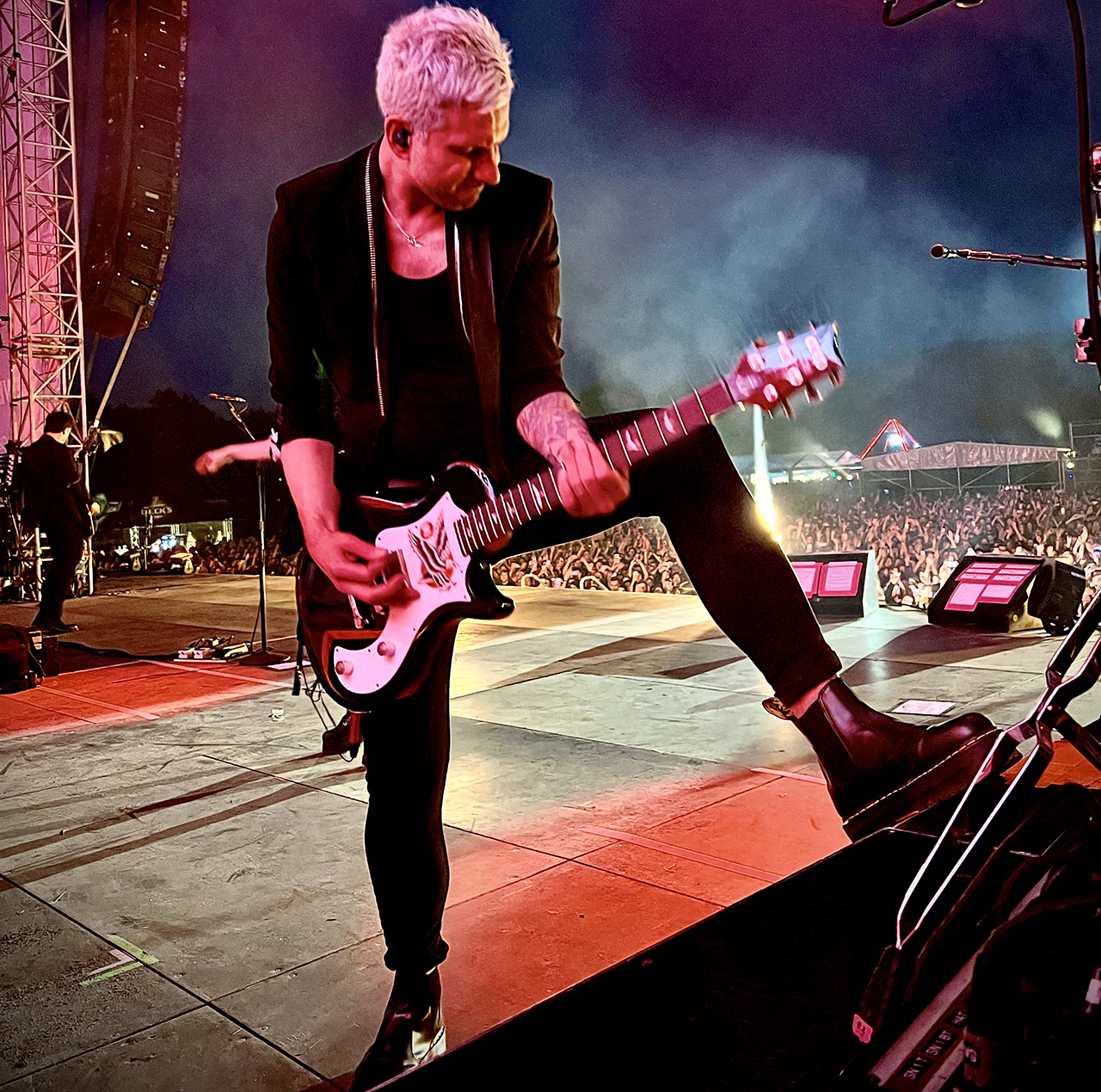 David Immerman performs onstage with Avril Lavigne