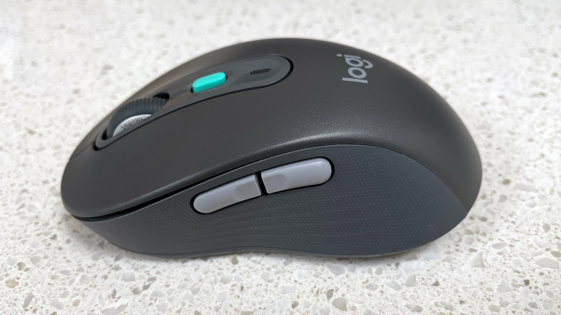 The Logitech Signature AI Edition M750 mouse on a worktop.