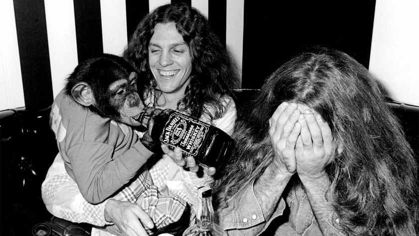 Lynyrd Skynyrd members Allen Collins (left) and Artimus Pyle with a jack Daniels-drinking chimp at a party in early 1976