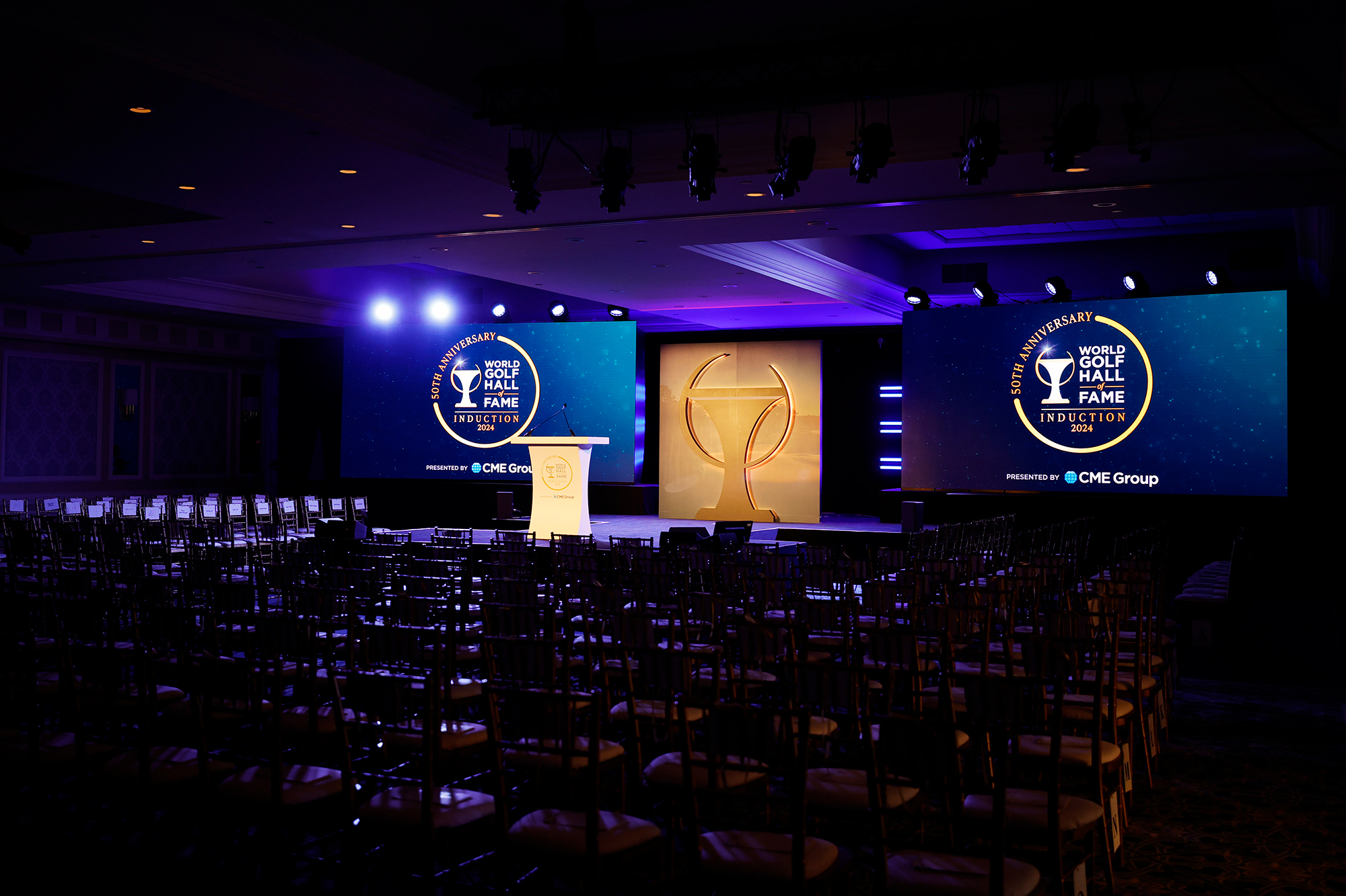World Golf Hall of Fame venue with stage in front of a large audience