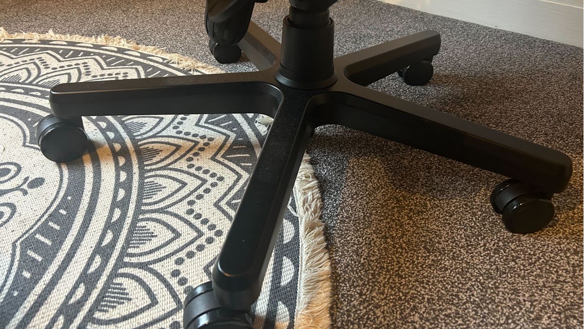 The castors and wheel base of the Noblechairs Legend
