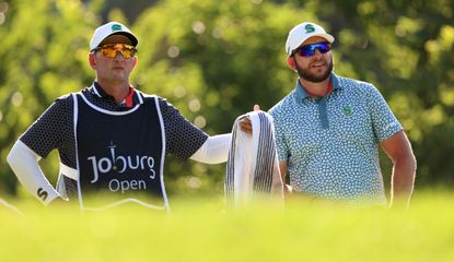 Dean Burmester chats to his caddie during the 2024 Joburg Open
