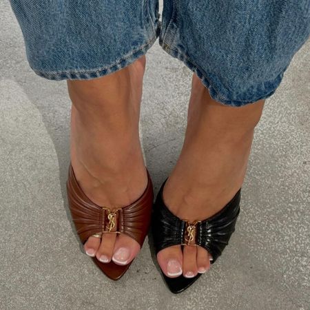 A woman wearing YSL heels with a sheer, French tip pedicure