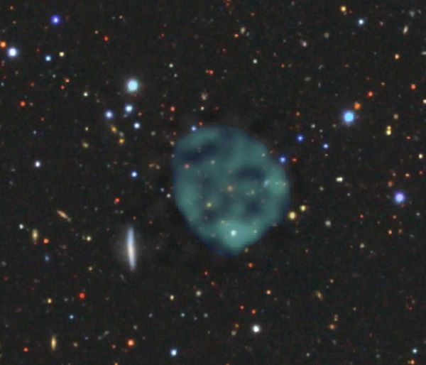 An image of an ORC, by Bärbel Koribalski, based on ASKAP data, with the optical image from the [Dark Energy Survey](https://www.darkenergysurvey.org)