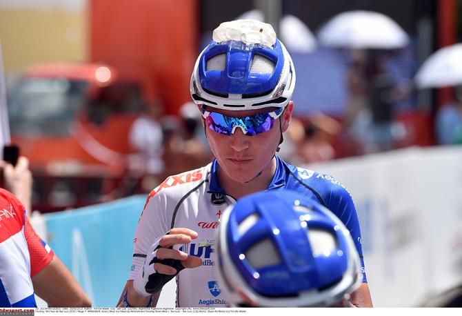 Janez Brajkovic puts ice in his helmet to stay cool