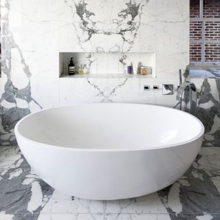 modern bathroom with book matched marble