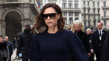 victoria beckham walking with sunglasses on - Victoria Beckham stuns in Italy
