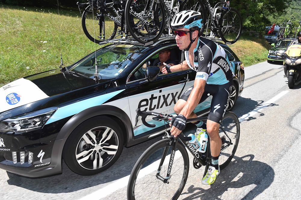 Rigoberto Uran chats at the team car