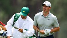 Rory McIlroy and caddie Harry Diamond during the second round of the 2023 Masters